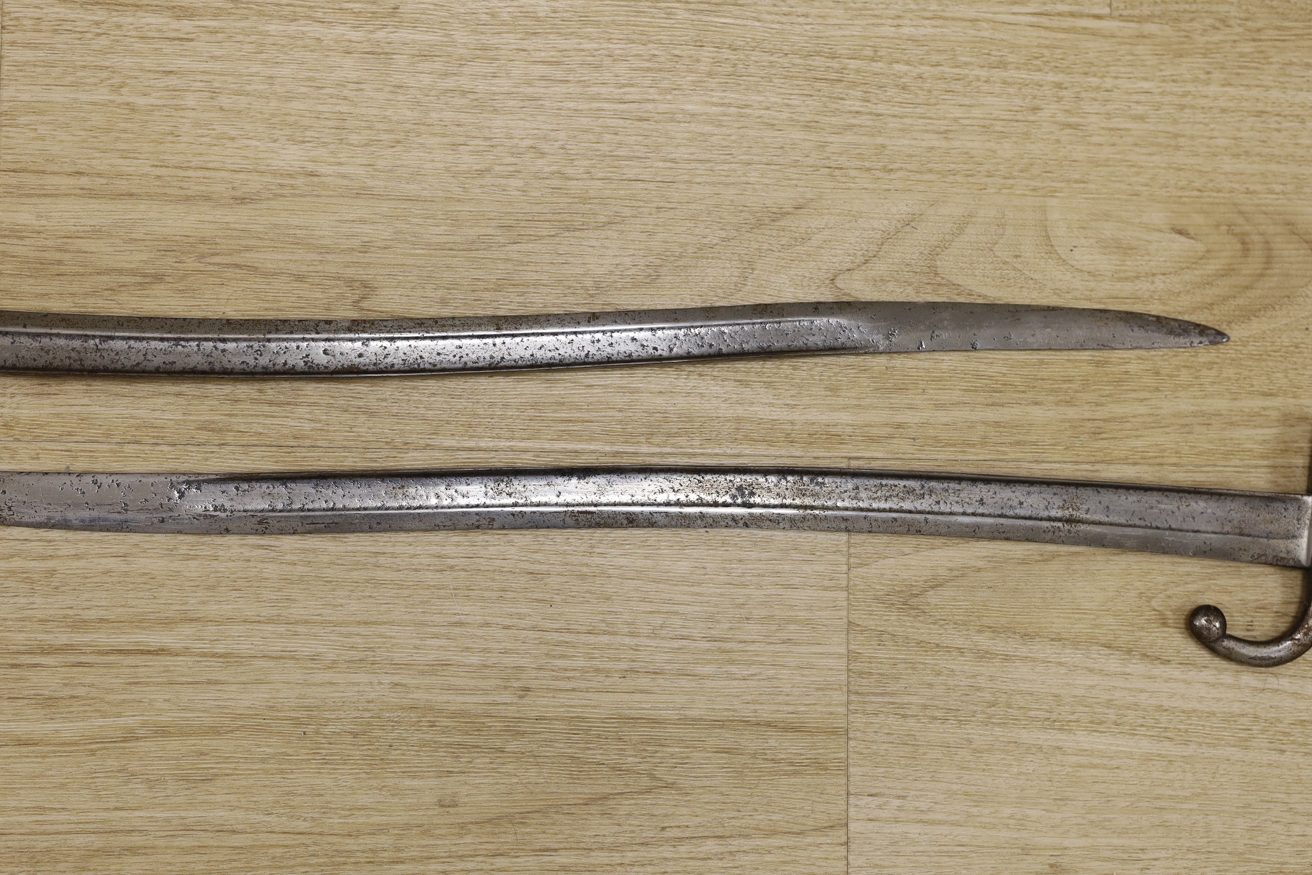 Two 19th century European bayonets, 69cm tall